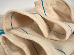 Cojín de lino antiguo de rayas azul turquesa