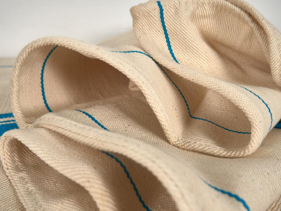 Cojín de lino antiguo de rayas azul turquesa