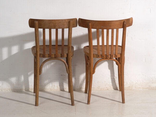 Pareja de sillas estilo Thonet de madera curvada con respaldo bajo – Centroeuropa, circa 1920