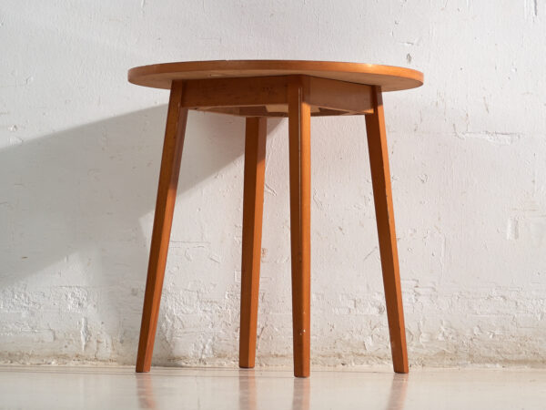 Mesa auxiliar vintage redonda en madera de teca – Europa central, circa 1960